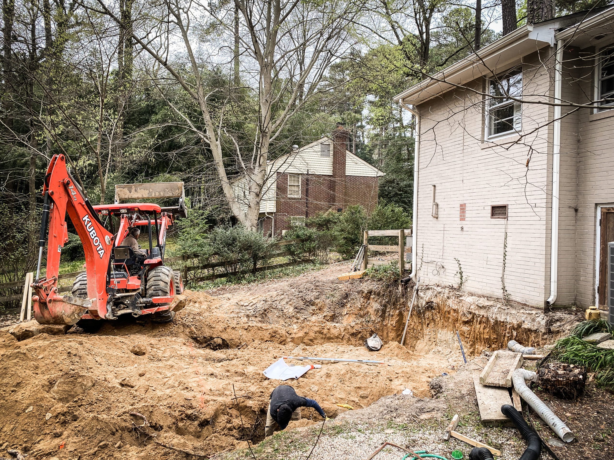 Construction for home addition with dirt and excavator